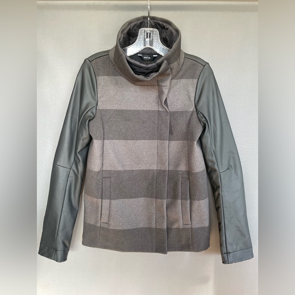 Lululemon sweat life striped jacket with pleather sleeves and high neck collar.